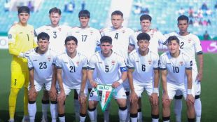Iraq national football team players ahead of start of a match.