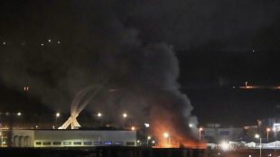 Smoke rises after an explosion at the airport in Erbil (Photo: AP)