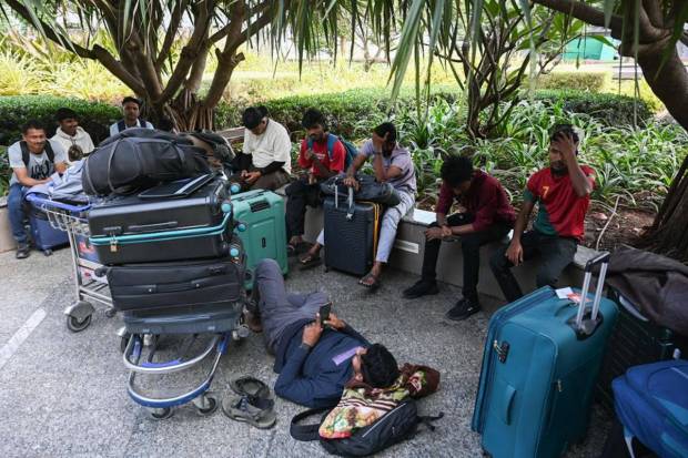 A group of travellers from Nepal are stuck at Terminal 2 of Chhatrapati Shivaji Maharaj International Airport in Mumbai as their trip to the Middle East is cancelled because of the ongoing Iran-Israel conflict. (Photo source: Express Photo)