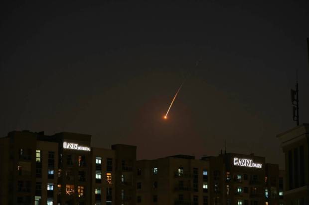 A projectile is seen in the night sky over Dubai’s skyline in the United Arab Emirates on Saturday, February 28, 2026. (Photo source: AP)