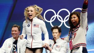 Visual of the Olympic Rings and the women athletes representing the policy alignment between the IOC and the Trump administration for LA 2028.