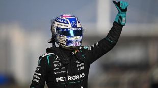 George Russell celebrates after securing sprint pole for the Chinese Grand Prix, leading a dominant qualifying performance for Mercedes-AMG Petronas Formula One Team in Shanghai.