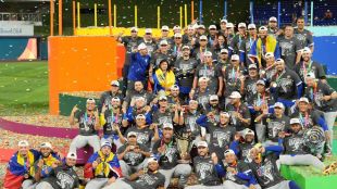 Venezuela team celebrates after beating USA to win World Baseball Classic championship.