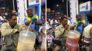 Man filling large plastic water jar with petrol at Villupuram Tamil Nadu petrol pump viral video