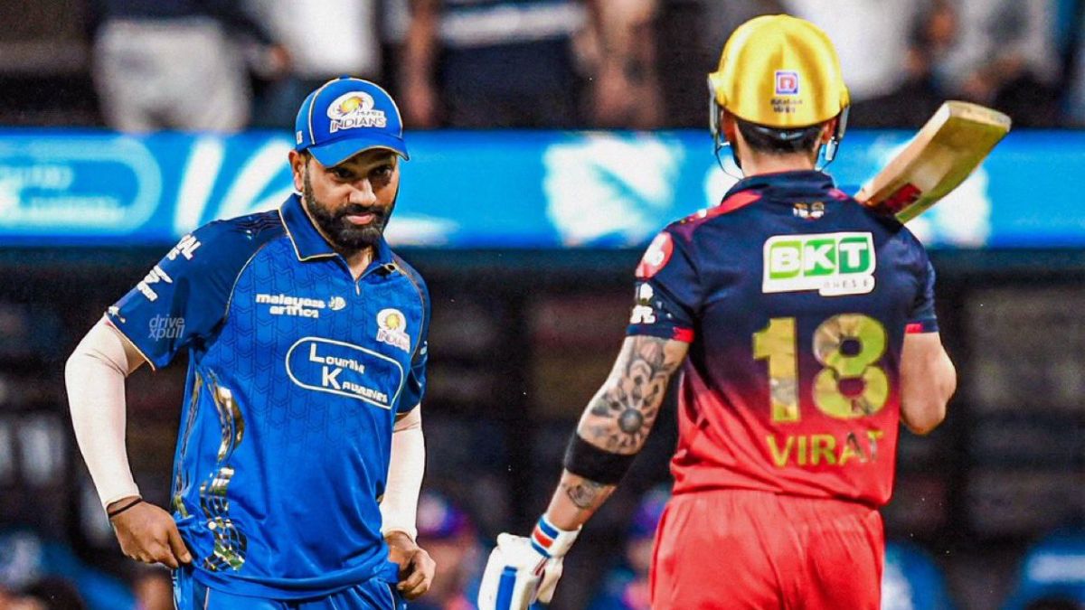 Virat Kohli and Rohit Sharma share a warm moment as RCB dominate MI with a 240-run show and seal an 18-run victory at Wankhede. Virat Kohli and Rohit Sharma share a warm moment as RCB dominate MI with a 240-run show and seal an 18-run victory at Wankhede.