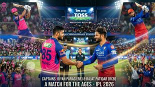 Riyan Parag (RR) and Rajat Patidar (RCB) share a powerful handshake at the toss, set against a glowing, packed stadium atmosphere.
