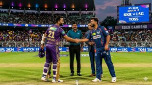 KKR captain Ajinkya Rahane and LSG captain Rishabh Pant shaking hands at the toss in the illuminated Eden Gardens Stadium for IPL 2026 Match 15.