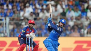 Quinton de Kock playing a powerful lofted leg-side shot for Mumbai Indians during his record-breaking 112* against Punjab Kings in IPL 2026.