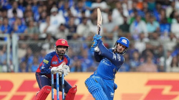 Quinton de Kock playing a powerful lofted leg-side shot for Mumbai Indians during his record-breaking 112* against Punjab Kings in IPL 2026.