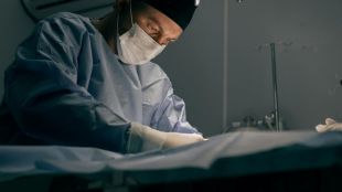 Top vascular surgeon stuck despite EB1A approval as USCIS freeze puts green card process on hold