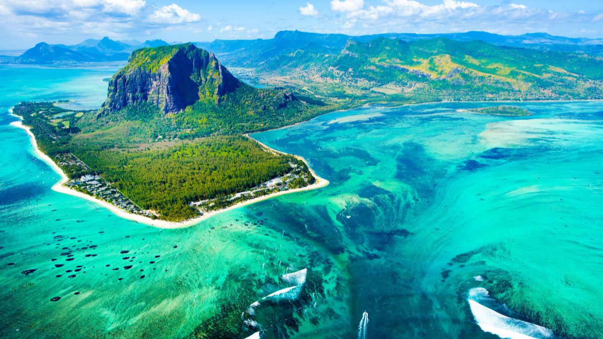 Volcanoes, purple sand, and oceanic waterfalls – This visa-free ...