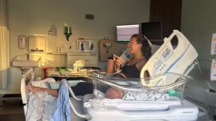 New mother attending a work call from hospital bed after delivery sparks online debate on work-life balance