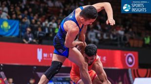 Image shows wrestling on a mat as Haryana emerges the wrestling factory of India.