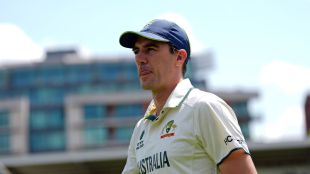 Image shows Pat Cummins in Australian Test attire
