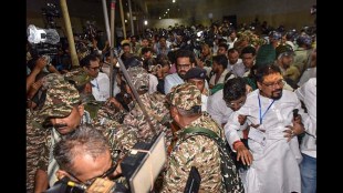 TMC leaders being stopped by security personnel outside a strong room at Khudiram Anushilan Kendra ahead of the counting of votes for Bengal Assembly elections.