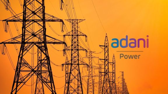 Close-up of a modern corporate financial terminal screen comparing Adani Power's projected 24% EBITDA CAGR and 20% RoCE targets alongside a loop showing an outstanding 64% year-on-year jump in Q4 net profits.