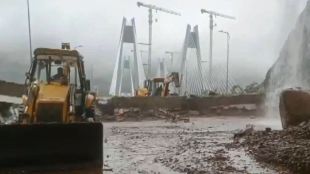 The State Highway Police said the landslide occurred near the exit of the first tunnel on the Pune-to-Mumbai carriageway of the Missing Link, also called the Connecting Link, and damaged the retaining wall at the site. (Source: Twitter)