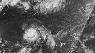 This satellite image from the National Oceanic and Atmospheric Administration shows Typhoon Bavi nearing the U.S. Pacific island territory of Guam on Sunday