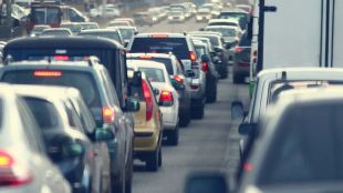 Passenger vehicles at a dealership as FADA reports record June retail sales and a sharp rise in alternative-fuel vehicle adoption.