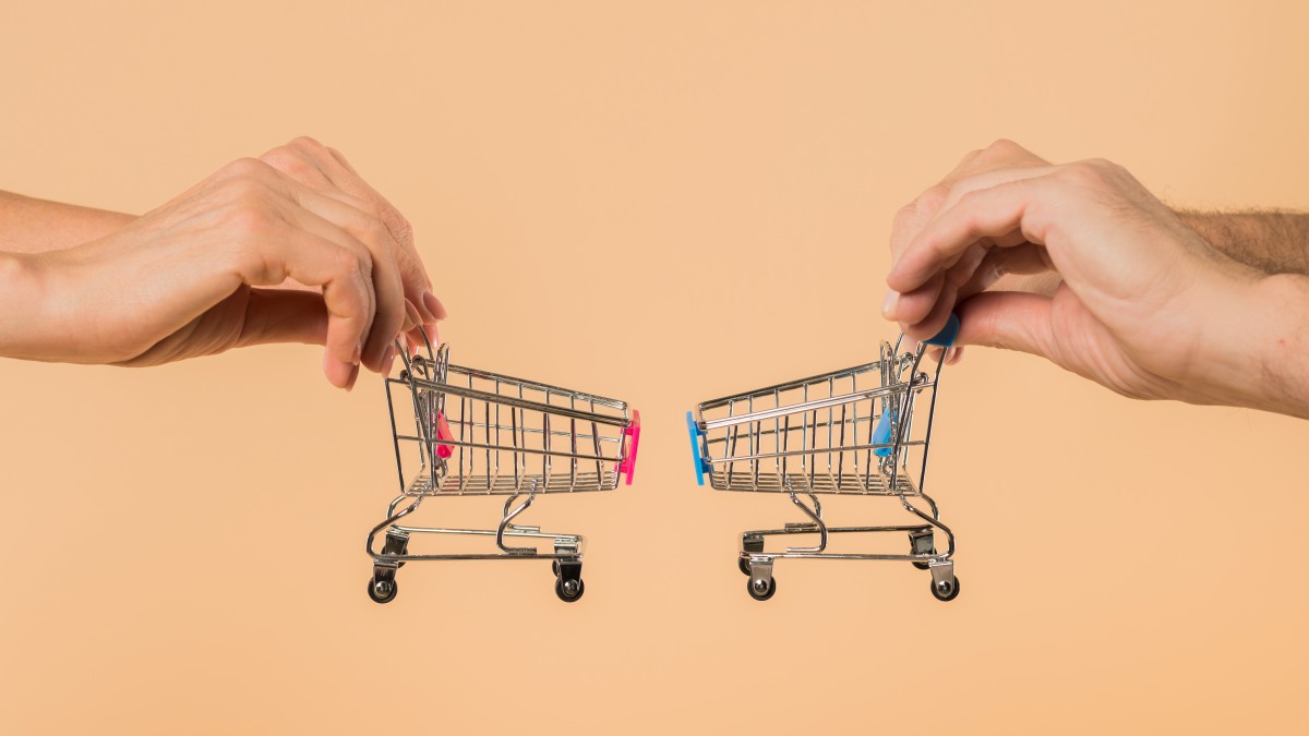 https://images.financialexpressdigital.com/2026/08/hands-holding-small-shopping-carts-1_20260722155011_20260730121434_20260827121706.jpg