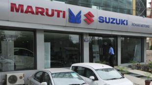 Financial research dashboard comparing Nomura's neutral price target of ₹14,071 with Motilal Oswal's bullish target of ₹17,064 (20% upside) for Maruti Suzuki stock following Q1FY27 financial results.