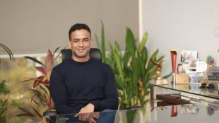 Portrait of Zerodha founder Nithin Kamath paired with a financial infographic illustrating Indian market depth metrics, comparing 13 crore registered investors against 20 to 30 lakh active daily traders and CAS closing auction order flow imbalances.