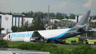 An Amazon cargo plane sits at the Miami International Airport (MIA) after it overshot the runway (Photo: AP)