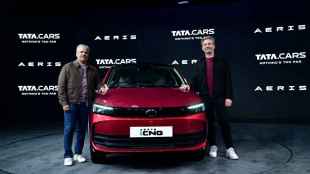 Anand Kulkarni, Chief Product Officer & HV Engineering, Tata, and Martin Uhlarik, Chief Design Officer, Tata Motors & Executive Director, TMDTC with the New Aeris