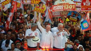 Luiz Inácio Lula da Silva wins a fourth presidential term after defeating Flávio Bolsonaro in Brazil's election run-off.
